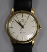 A gentleman's 1960's 9ct gold Omega manual wind wrist watch, movement c.600.