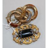 Two gold and agate brooches.