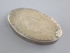 A George III silver oval snuff box by Phipps & Robinson, with engraved decoration and flowerhead