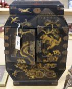 A Japanese gilt decorated black lacquer cabinet, H.49cm W.35.5cm