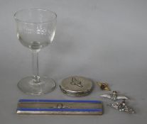R.A.F. related silver and enamel comb, 3 "wings" pins, a silver compact and a liqueur glass