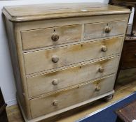A Victorian style pine chest, of two short and three long drawers, W.3ft 11in.