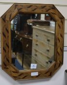 A parquetry wall mirror, W.1ft 8in. H.1ft 6in.
