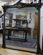 A Victorian aesthetic period ebonised overmantel, 5ft 4in. H.5ft 8in.