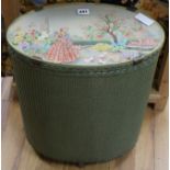A 1920's Lloyd Loom style box with embroidered top