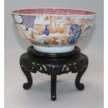 An 18th century Chinese famille rose bowl and wood stand, Diameter 18.5cm, H.8.5cm without stand