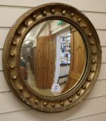 A mahogany-framed rectangular mirror and a Regency style gilt-framed convex mirror, W.1ft 11in.
