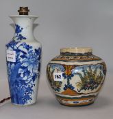 A Chinese porcelain vase, blue and white, with birds in peony trees, fitted as a table lamp and an