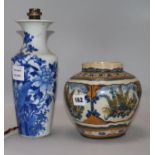 A Chinese porcelain vase, blue and white, with birds in peony trees, fitted as a table lamp and an