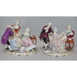 A German porcelain conversation group of three elegant figures and one other similar (cracked)