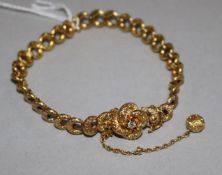 A late Victorian gold and diamond set fancy link bracelet, gross weight 13.5 grams.