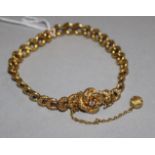 A late Victorian gold and diamond set fancy link bracelet, gross weight 13.5 grams.