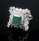 A 19th century style white gold, emerald and diamond cluster ring, of square form with raised