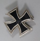 A World War II Iron Cross 1st class pin, marked 65