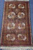 A Persian Tekke style rug, 4ft 11in. x 2ft 9in.