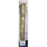 A pair of Giallo Antico marble Ionic columns, H.4ft 2in.