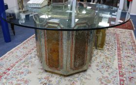 An Rodolfo Dubarry brass, white metal and copper overlaid glass top centre table, W.4ft 11in.