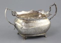 A George III Irish silver two handled sugar bowl by Richard Sawyer, of rounded rectangular form with