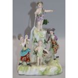 A Continental porcelain figure group 8.5in.