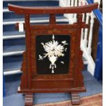 A Japanese Meiji period lacquer and carved bone screen, W.2ft 9in. H.3ft 5in.