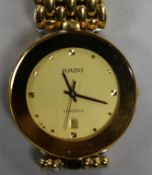 A Rado gold-plated wristwatch.