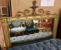 An Edwardian gilt gesso wall mirror, W.3ft 10in. H.4ft