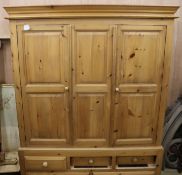 A modern pine wardrobe, W.5ft 4in. H.6ft 8in.