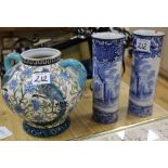 A modern Persian style two handled vase and a pair of blue and white sleeve vases