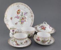 A Dresden thirty five piece tea service, painted with floral sprays