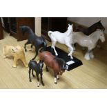 Six Beswick models of horses and a Beswick Lion