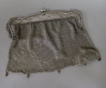 An early 20th century silver mesh evening purse and a small French silver mesh money purse.