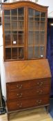 An Edwardian satinwood bureau bookcase, W.77cm