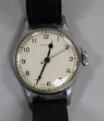 A gentleman's steel Longines military issue manual wind wrist watch, case back engraved with broad