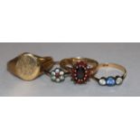 Three 9ct gold and gem set rings and a 9ct gold signet ring.