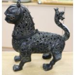 An Islamic bronze 'tiger' incense burner H. 11.5in.