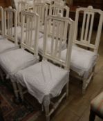 A set of ten Swedish white painted beech dining chairs