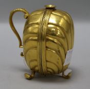 A German gilt brass wax jack, 18th century