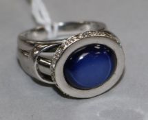 A star sapphire and diamond dress ring, 18ct white gold setting and shank, size P.