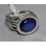A star sapphire and diamond dress ring, 18ct white gold setting and shank, size P.