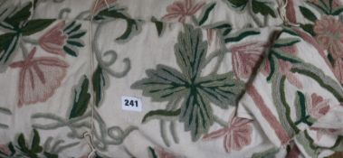 A roll of crewelwork fabric retailed by Liberty, London