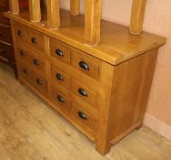 A large oak chest of drawers W.151cm