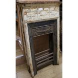 A pair of small Victorian cast iron fire surrounds W.70cm