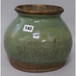 A 19th century Celadon Shiwan green glazed pottery jar H.20cm