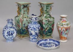 A pair of Chinese famille rose celadon ground vases, two blue and white vases and a spoon tray,