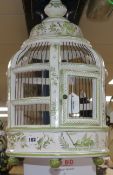 A Continental pottery hanging lantern, white and pale green glazed with birds and flowers H.31cm