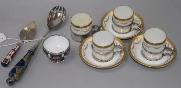 A part set of Paragon silver-mounted coffee cans and saucers, a Victorian silver-mounted trowel/