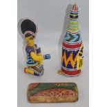 A Nigerian beadwork-covered glass bottle, with mask and geometric decoration and a similar