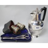 A cased pair of opera glasses, pair of plated grape scissors and a coffee pot