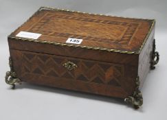 A French ormolu and marquetry box W.31.5cm