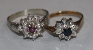 A ruby and rose diamond cluster ring on 18ct white gold shank and a sapphire and diamond